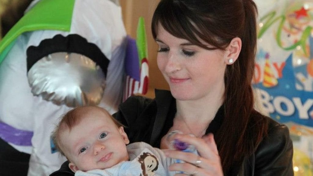 Natacha Van Honacker with her child  Leo Hazard